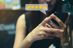 Customer review good rating concept, people use smartphone with five star icon, positive costume