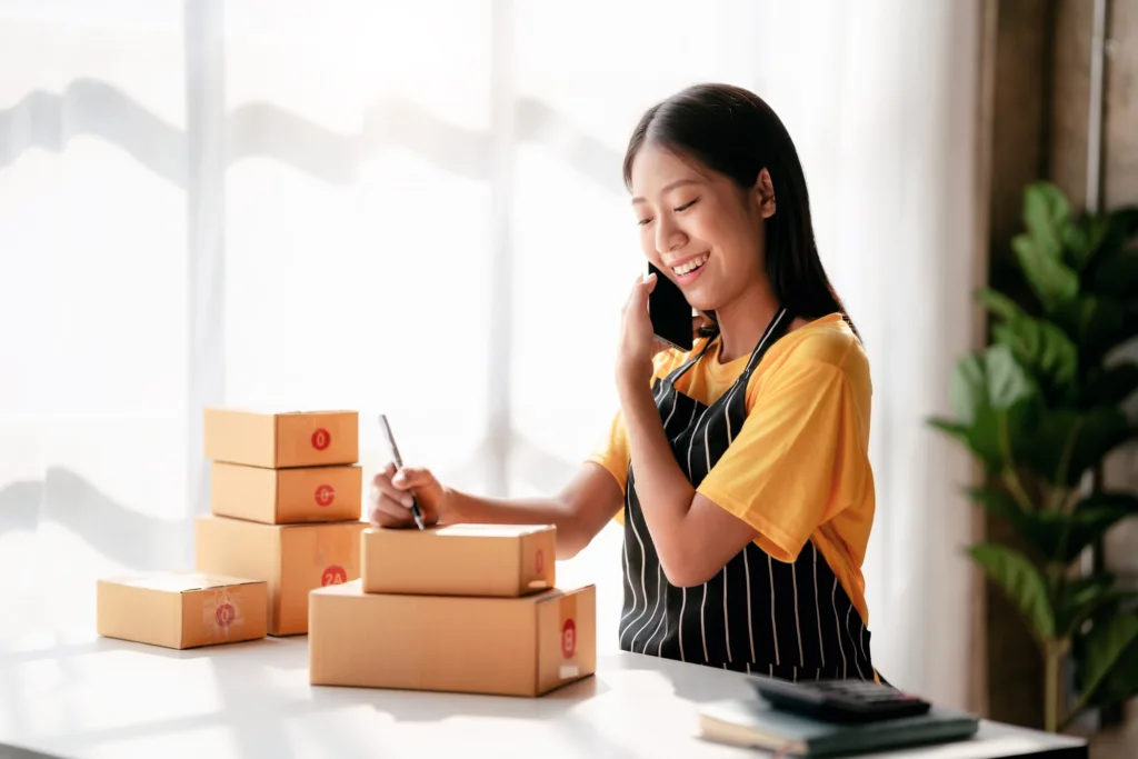 Small business parcel delivery concept, Female entrepreneur talk digital