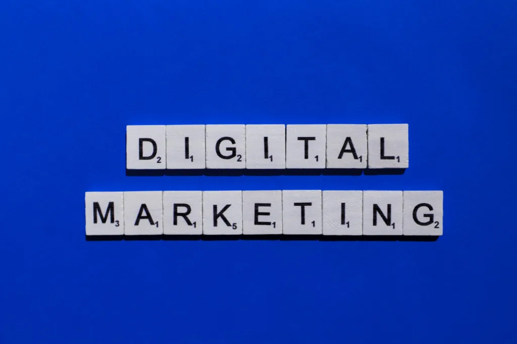 Digital marketing scrabble letters word on a blue background
